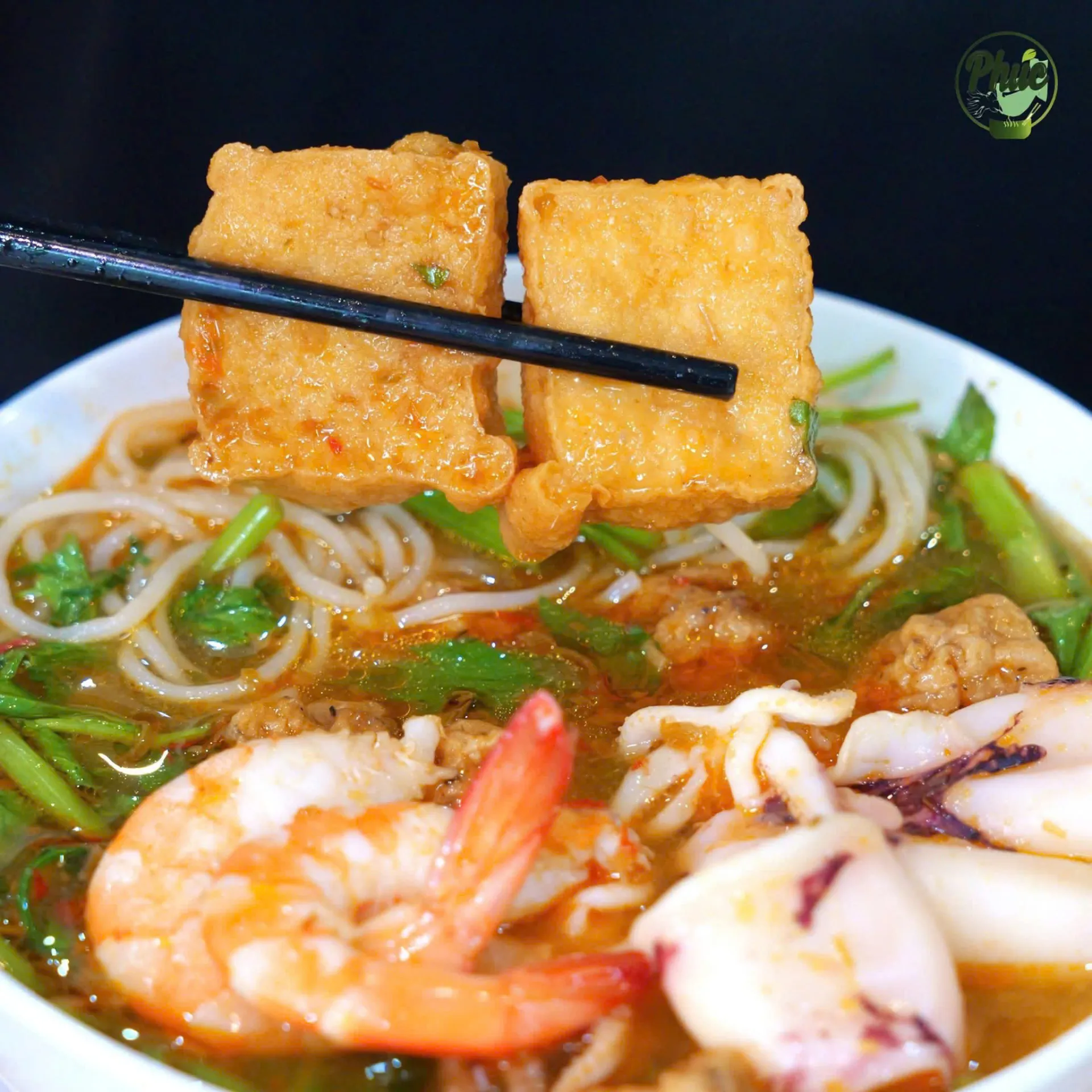 Phuc restaurant - Squid noodle soup: Enjoying fresh seafood and richly traditional "cu lao" hotpot